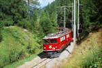 Lokomotiva: Ge 6/6 705 | Vlak: D 525 Bernina-Express ( Chur - St.Moritz ) | Msto a datum: Bergn/Bravuogn 05.08.1994