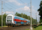 Lokomotiva: 971.002-1 | Vlak: Os 2120 ( Pardubice hl.n. - Praha Masarykovo n. ) | Msto a datum: Chvaletice 16.07.2009